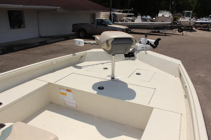 Slide: The Image of 2020 Alumacraft 20 Coastal Bay boat interior with seating and storage compartments. - 25