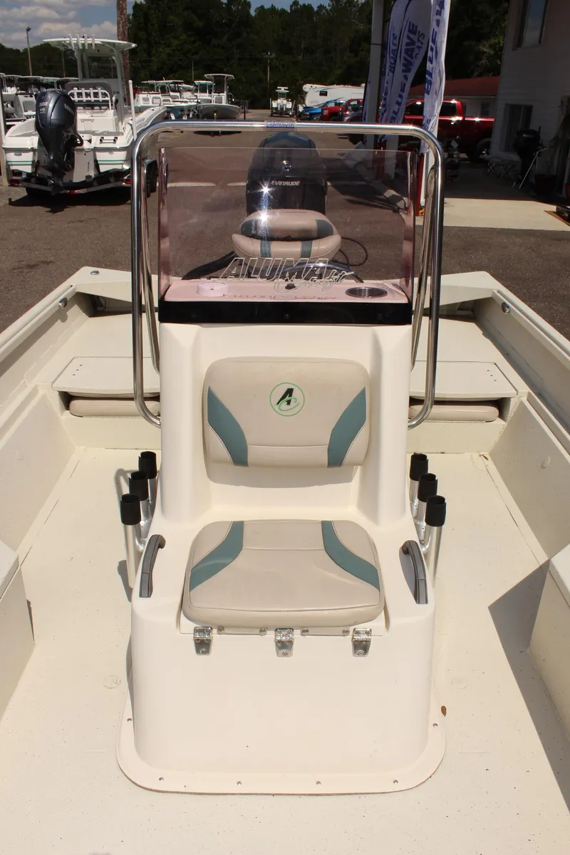 Slide: The Image of 2020 Alumacraft 20 Coastal Bay boat interior with console and seating. - 32