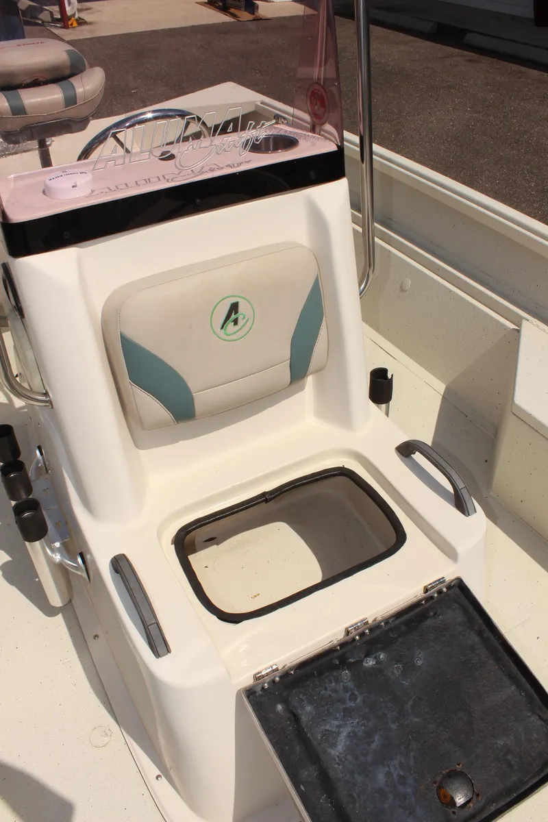 Slide: The Image of 2020 Alumacraft 20 Coastal Bay boat console with storage compartment. - 33