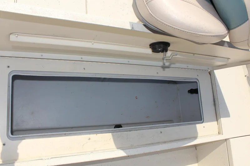 Slide: The Image of 2020 Alumacraft 20 Coastal Bay boat storage compartment with seat. - 35