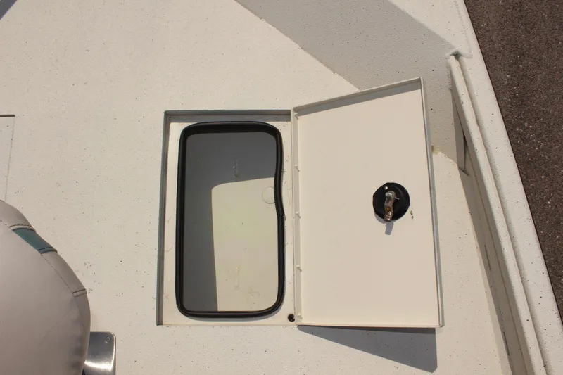 Slide: The Image of Open storage compartment on 2020 Alumacraft 20 Coastal Bay boat. - 37