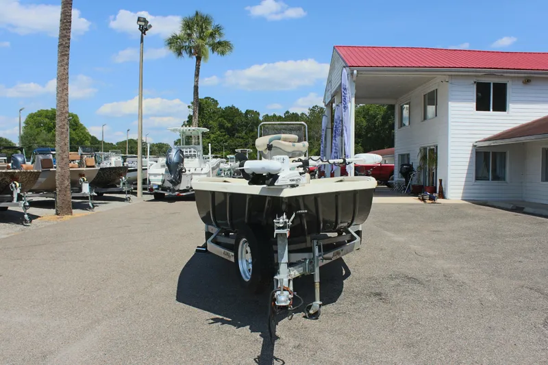 Slide: The Image of 2020 Alumacraft 20 Coastal Bay boat on trailer at dealership, sunny day. - 4