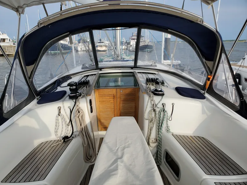 Slide: The Image of Beneteau 43 sailboat cockpit, 2008 model, with seating and nautical equipment. - 15