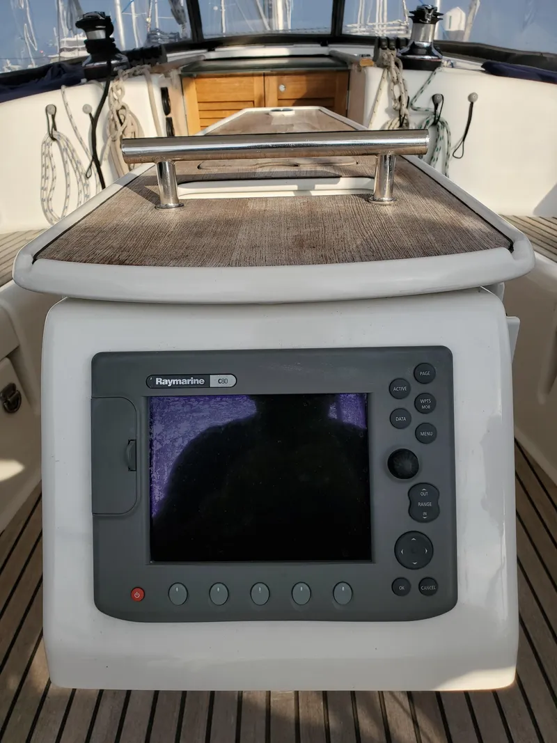 Slide: The Image of Beneteau 43 sailboat cockpit with Raymarine navigation system, 2008 model. - 30