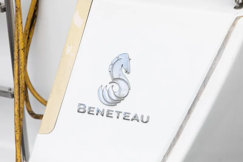 Slide: The Image of Beneteau 43 logo on a 2008 model yacht, featuring a seahorse emblem. - 32