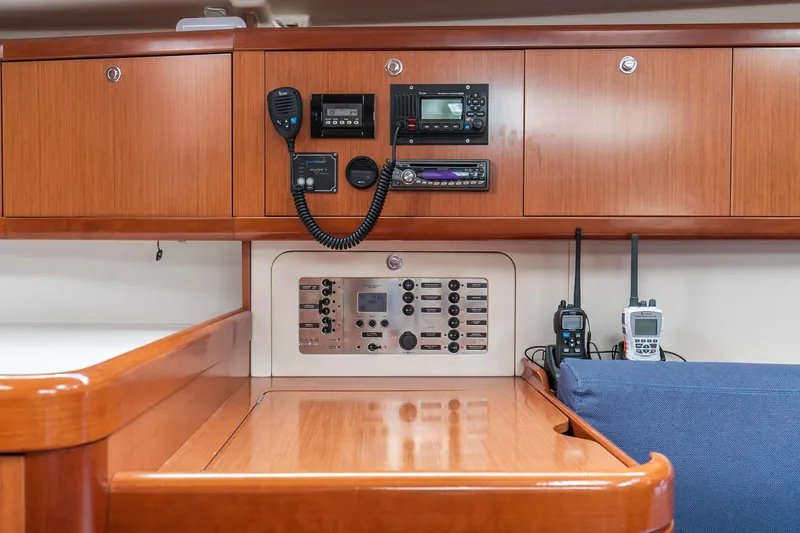 Slide: The Image of Beneteau 43 yacht interior control panel with communication devices, 2008 model. - 44