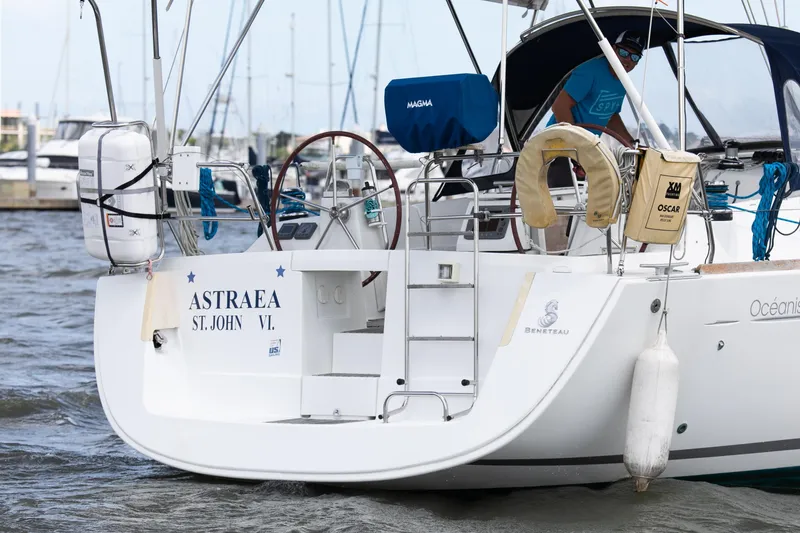 Slide: The Image of Beneteau 43 sailboat, 2008 model, named Astraea, docked in a marina. - 7