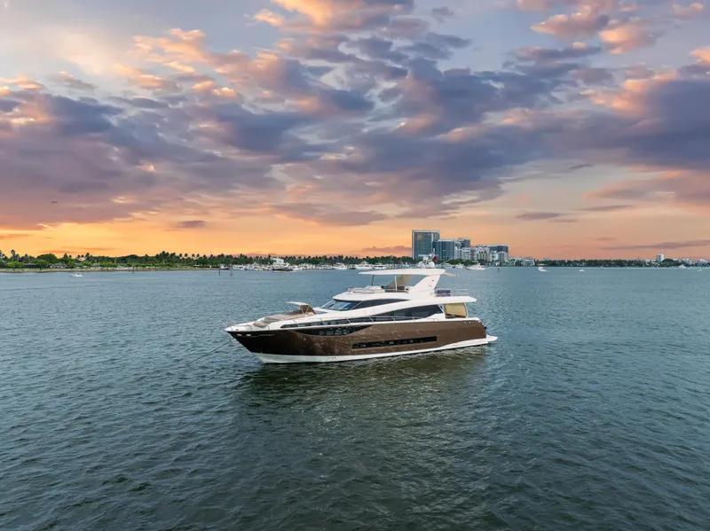 Slide: The Image of Luxury Prestige 750 yacht cruising at sunset, 2015 model. - 13