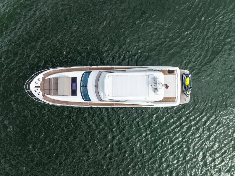 Slide: The Image of Aerial view of 2015 Prestige 750 yacht on open water. - 14