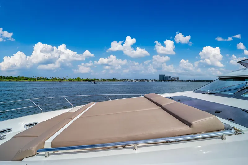 Slide: The Image of Luxury yacht Prestige 750, 2015 model, cruising on a sunny day with blue skies. - 21