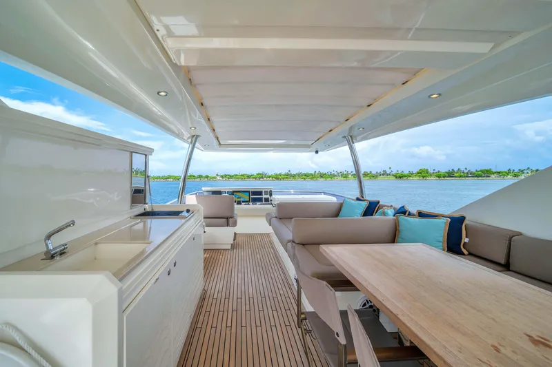 Slide: The Image of Luxurious 2015 Prestige 750 yacht interior with elegant seating and ocean view. - 29