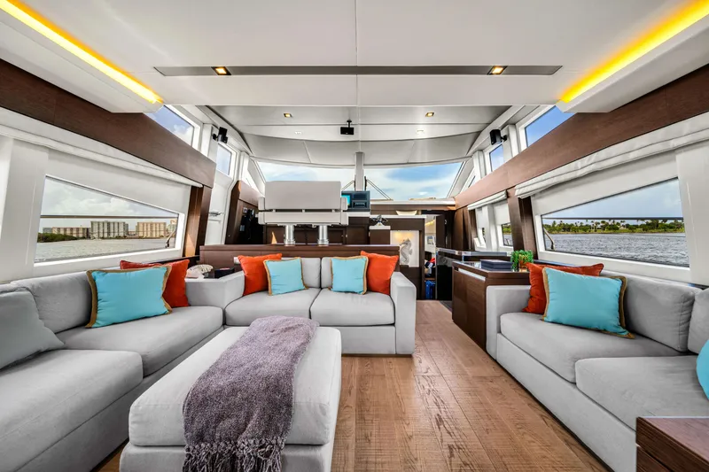 Slide: The Image of Luxurious interior of a 2015 Prestige 750 yacht with modern decor and panoramic windows. - 34