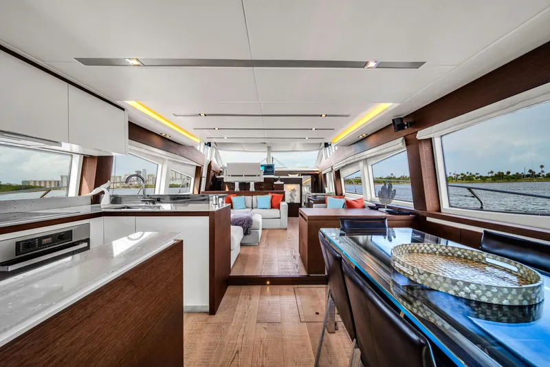 Slide: The Image of Luxurious interior of 2015 Prestige 750 yacht with modern design and panoramic windows. - 35