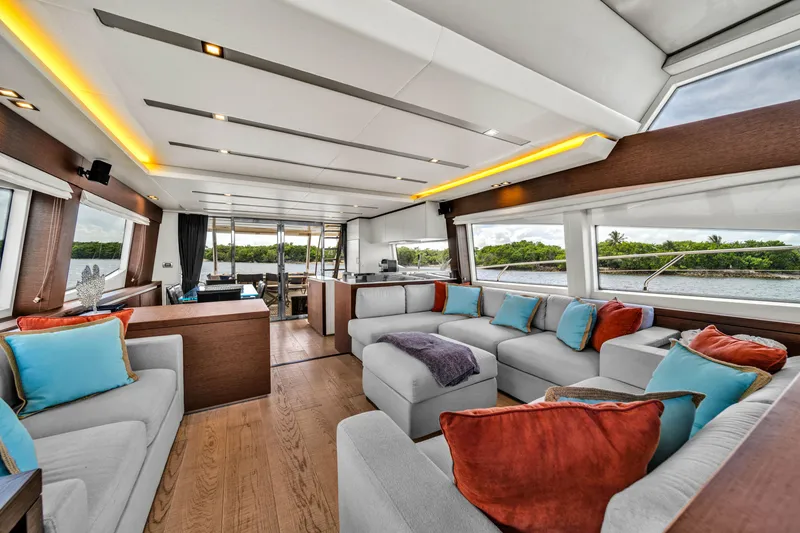 Slide: The Image of Luxurious 2015 Prestige 750 yacht interior with modern seating and vibrant cushions. - 38