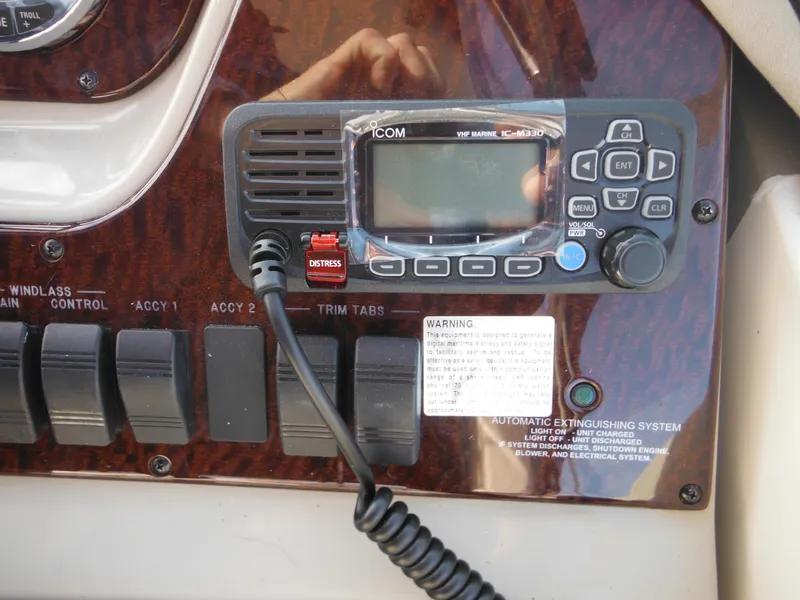 Slide: The Image of Control panel of a 2010 Sea Ray 260 Sundancer with Icom marine radio. - 14