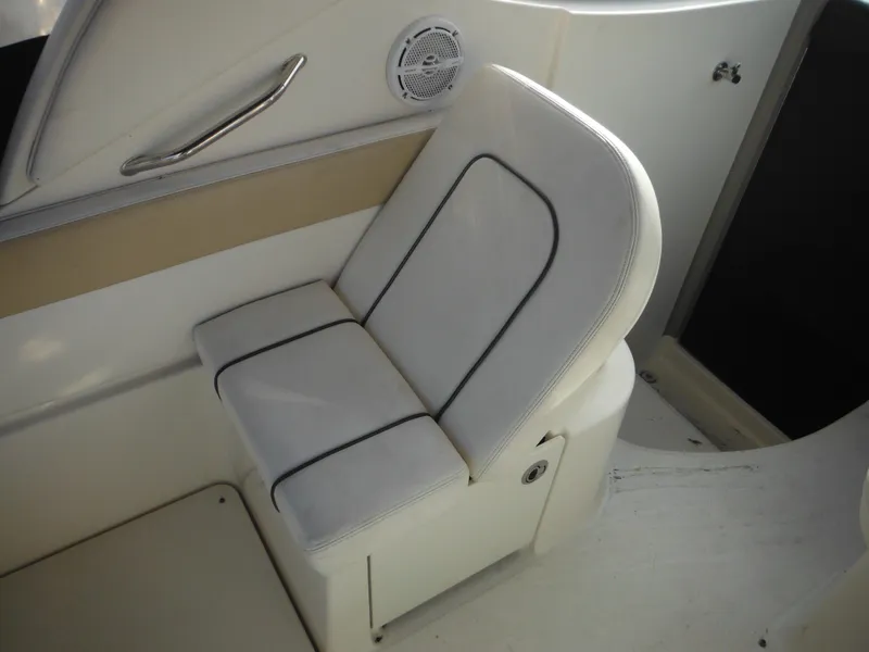 Slide: The Image of White seat on 2010 Sea Ray 260 Sundancer boat interior. - 28