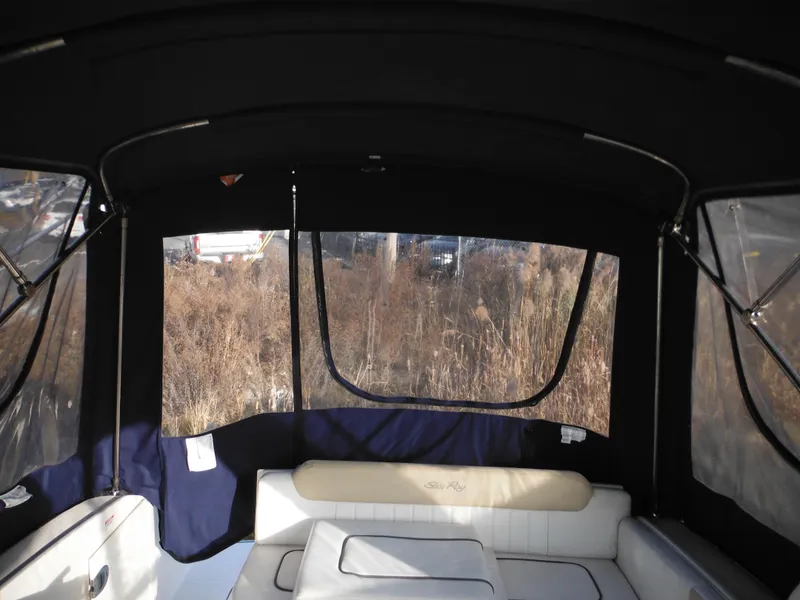 Slide: The Image of Interior view of 2010 Sea Ray 260 Sundancer with canopy and seating. - 30