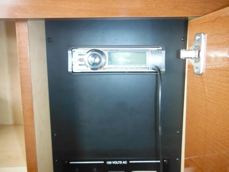 Slide: The Image of Sony stereo system inside 2010 Sea Ray 260 Sundancer cabinet. - 46