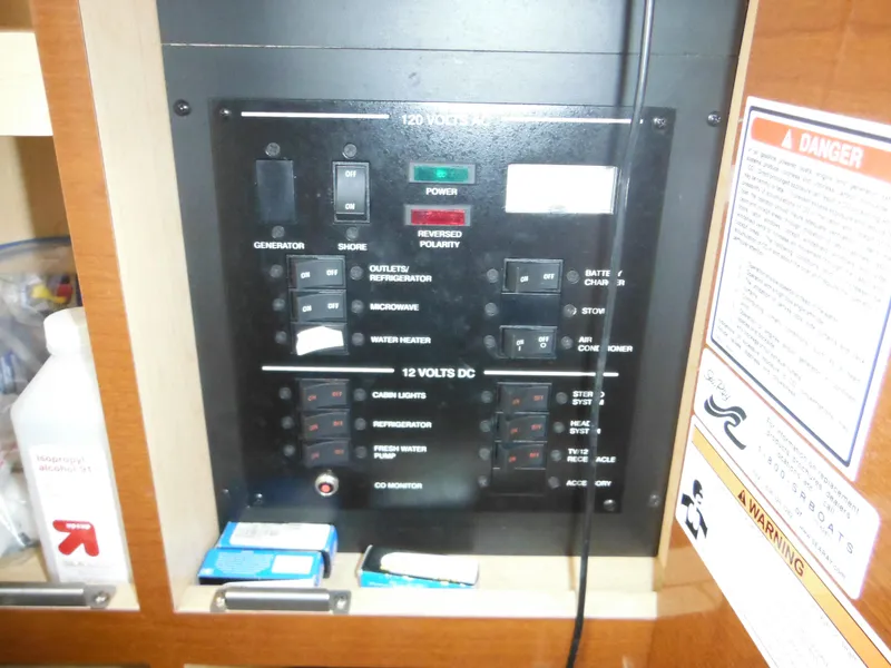 Slide: The Image of Electrical control panel on 2010 Sea Ray 260 Sundancer boat. - 47