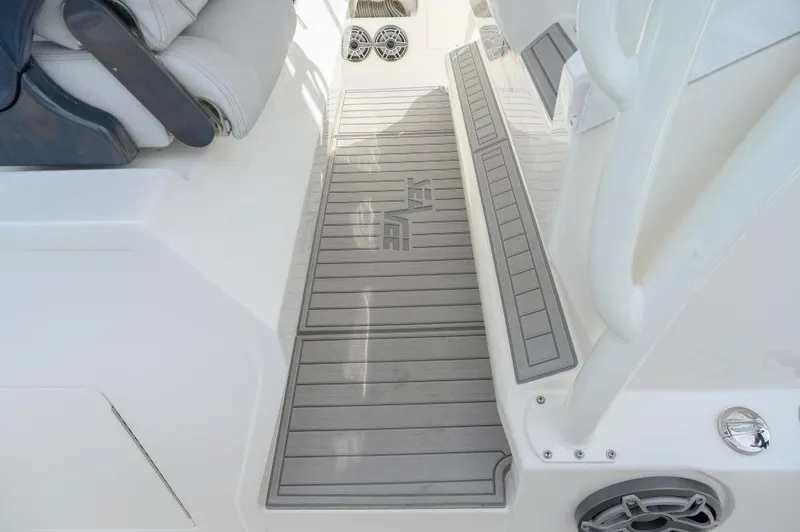 Slide: The Image of 2023 SeaVee 420Z boat deck with cushioned seating and non-slip flooring. - 10