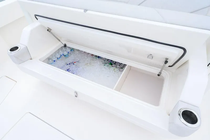 Slide: The Image of Open cooler with ice and drinks on 2023 SeaVee 420Z boat. - 14