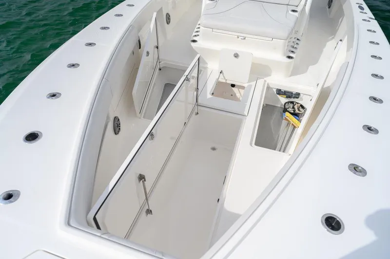 Slide: The Image of 2023 SeaVee 420Z boat interior with spacious storage compartments and sleek design. - 24