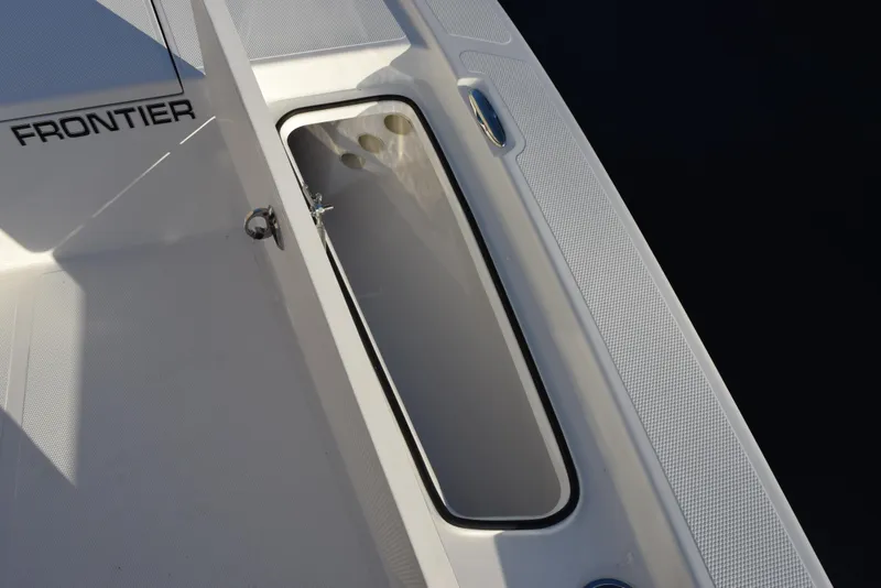 Slide: The Image of Frontier 2104 boat deck with storage compartment, 2025 model. - 16