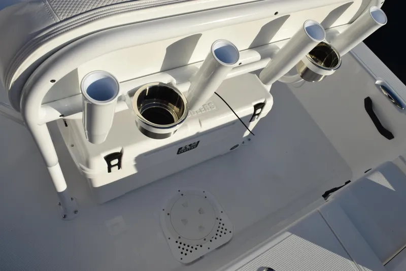 Slide: The Image of Frontier 2104 boat, 2025 model, featuring rod holders and storage compartment. - 22