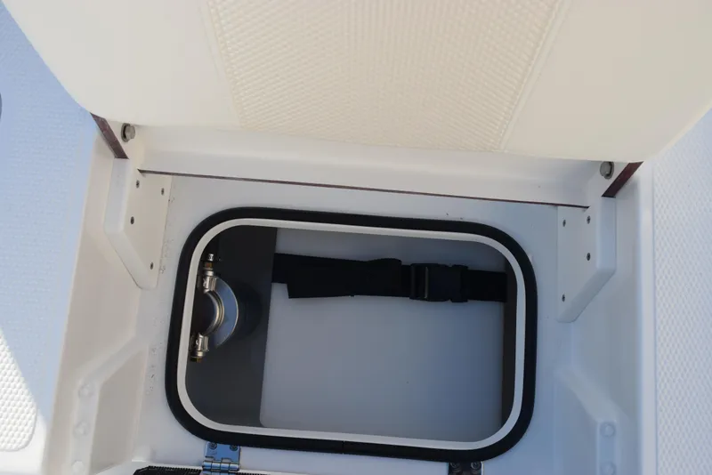 Slide: The Image of Open storage compartment in 2025 Frontier 2104 boat. - 24