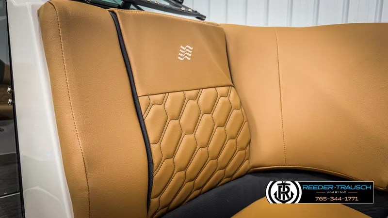 Slide: The Image of Luxurious tan leather seating in 2025 Four Winns H2 boat interior. - 45