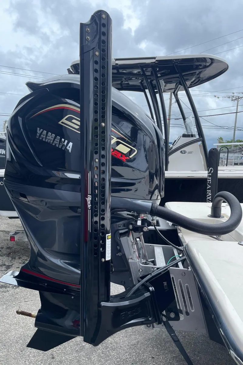 Slide: The Image of 2024 ShearWater X22 boat with Yamaha engine, featuring sleek design and advanced technology. - 4
