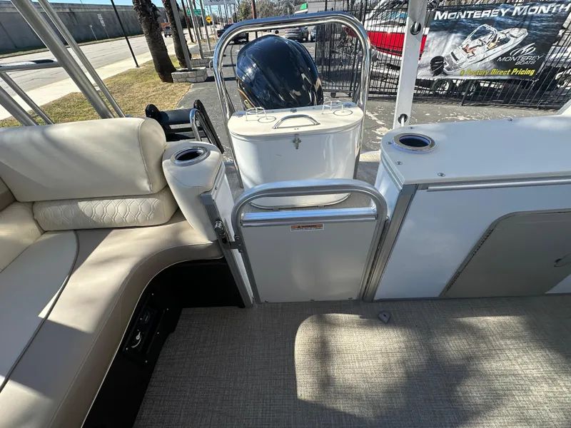 Slide: The Image of 2025 Avalon Catalina Cruise Funship interior with seating and helm station. - 16