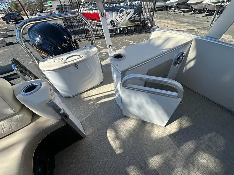 Slide: The Image of 2025 Avalon Catalina Cruise Funship interior with seating and storage compartments. - 18