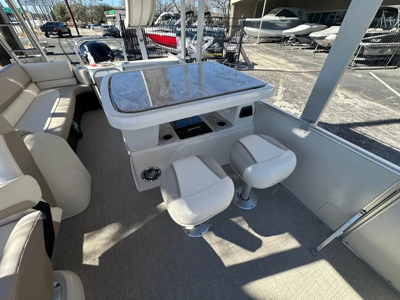 Slide: The Image of 2025 Avalon Catalina Cruise Funship interior with seating and table setup. - 22