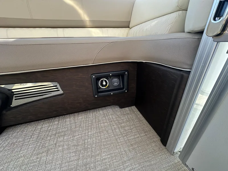 Slide: The Image of 2025 Avalon Catalina Cruise Funship interior seating with power outlet. - 29