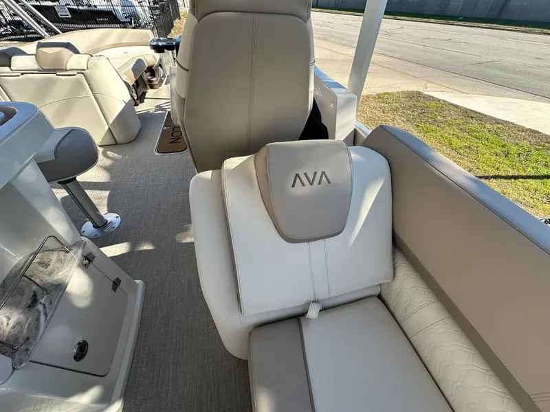 Slide: The Image of 2025 Avalon Catalina Cruise Funship interior with beige seating and AVA logo. - 35