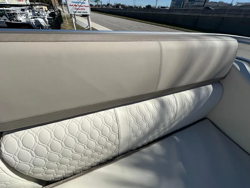 Slide: The Image of 2025 Avalon Catalina Cruise Funship 27' boat seat with elegant white upholstery. - 44