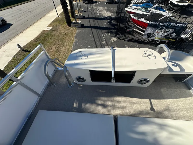 Slide: The Image of 2025 Avalon Catalina Cruise Funship boat deck with seating and ladder. - 46