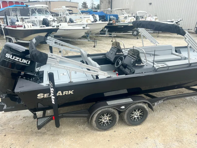Slide: The Image of 2024 SeaArk BIG EASY 24 boat with Suzuki engine on trailer. - 4