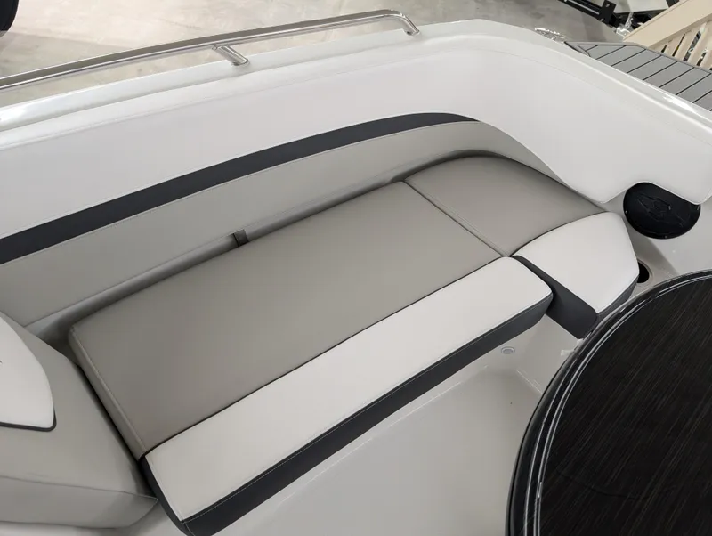 Slide: The Image of 2025 Starcraft SVX 191 OB boat interior with sleek gray seating and modern design. - 5