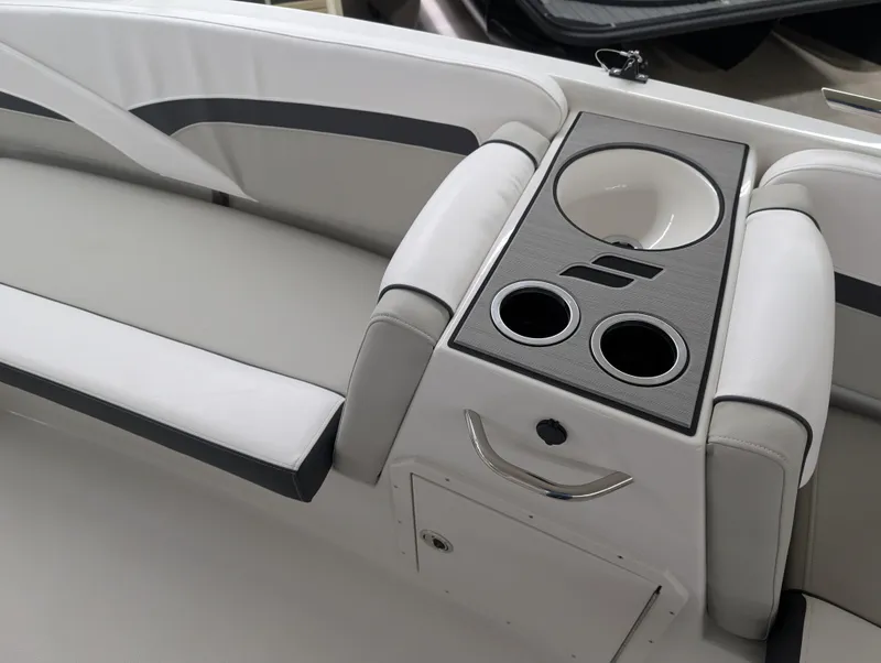 Slide: The Image of 2025 Starcraft SVX 191 OB boat interior with cup holders and seating. - 6