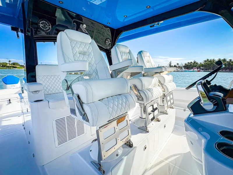 Slide: The Image of Luxurious interior of 2025 HCB 48 Campeon boat with plush seating and modern design. - 18