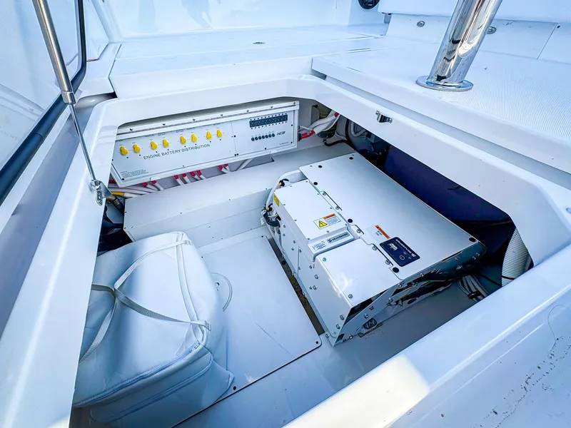 Slide: The Image of 2025 HCB 48 Campeon boat electrical system and storage compartment. - 33