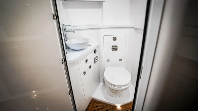 Slide: The Image of Luxurious bathroom in 2025 HCB 48 Campeon boat with modern fixtures. - 38