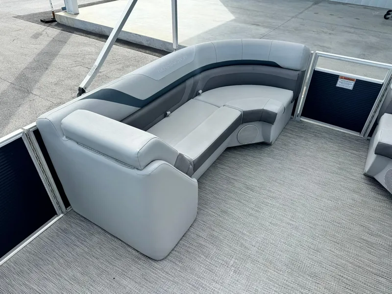 Slide: The Image of 2020 Bennington 22SSXAPG pontoon boat with gray seating and carpeted deck. - 16