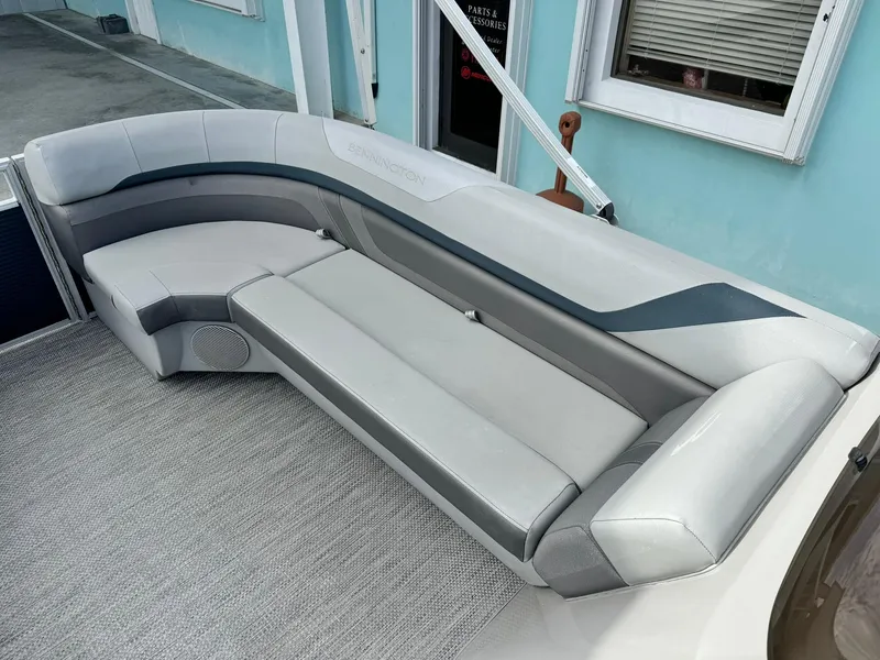 Slide: The Image of 2020 Bennington 22SSXAPG pontoon boat with sleek gray seating and modern design. - 17