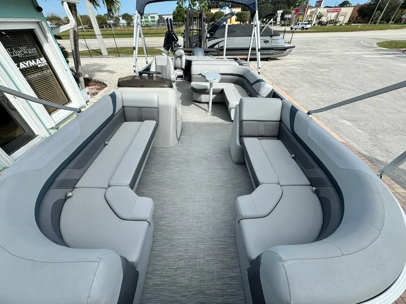 Slide: The Image of 2020 Bennington 22SSXAPG pontoon boat with spacious seating and modern design. - 18