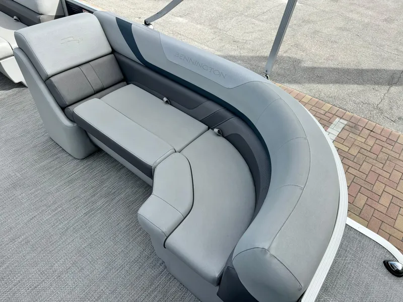 Slide: The Image of 2020 Bennington 22SSXAPG boat interior with gray seating and carpeted flooring. - 20