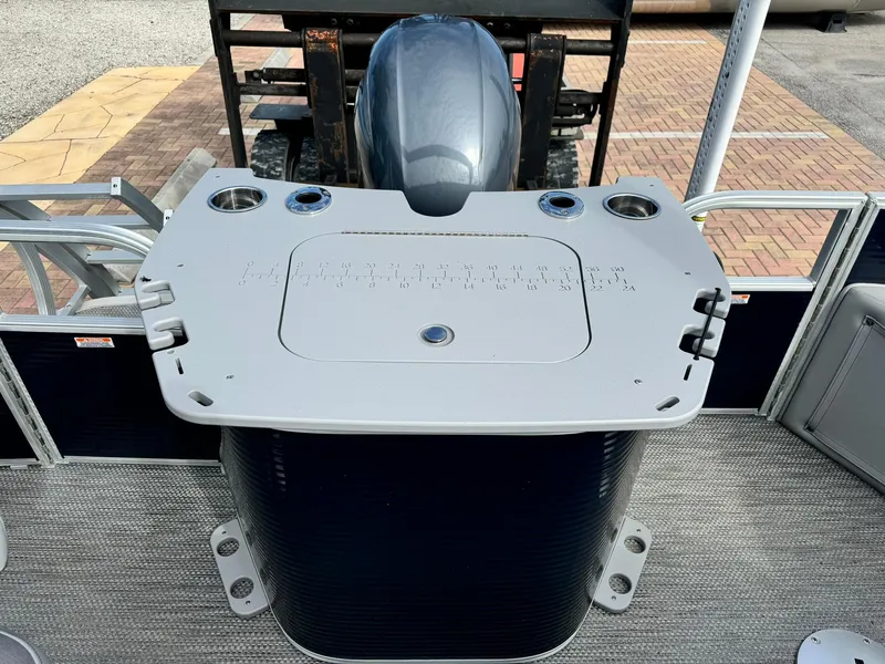 Slide: The Image of 2020 Bennington 22SSXAPG pontoon boat with motor and fishing station. - 8