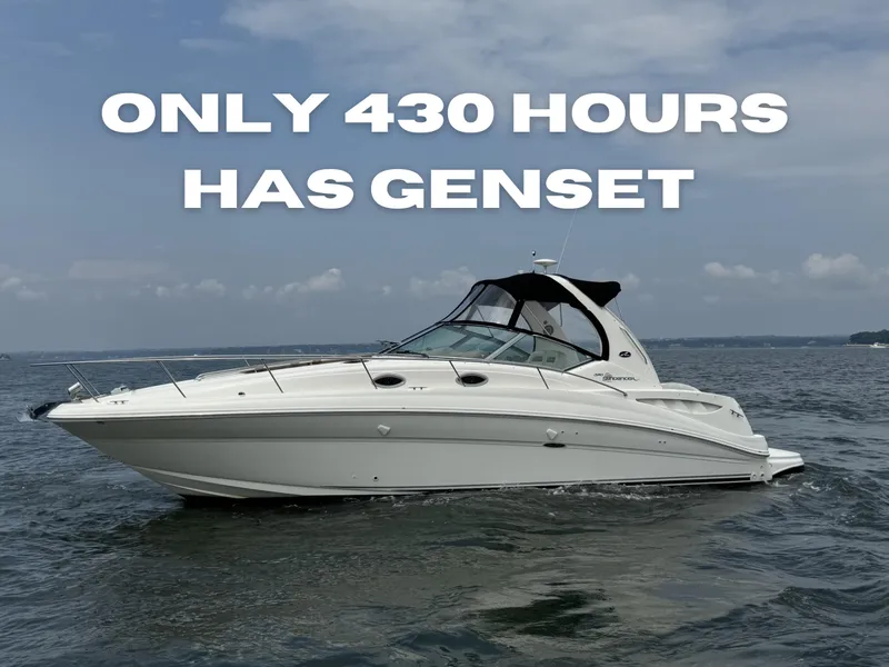 Slide: The Image of 2004 Sea Ray 320 Sundancer boat on water, text: "Only 430 hours, has genset." - 0